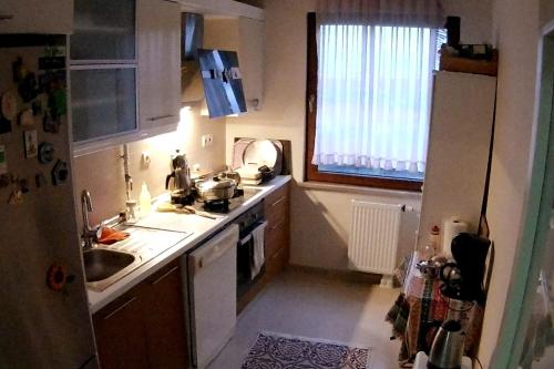 a small kitchen with a sink and a refrigerator at Private Room in Istanbul #45 in Tuzla