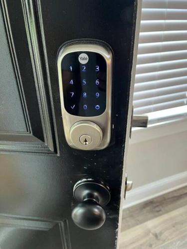 a close up of a door with a remote control at Family Beach Fun Spot, Firepit, Games, FireTV in Michigan City