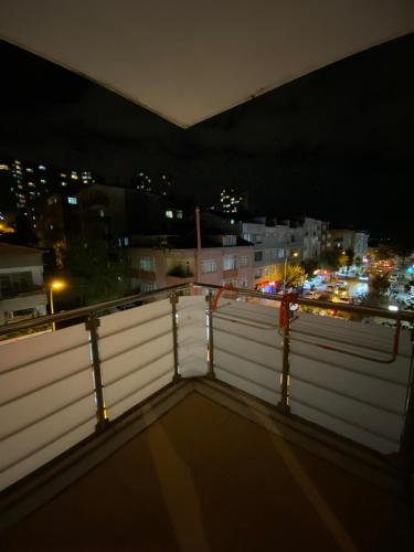a view of a city from a balcony at night at Private Room in Istanbul #47 in Pendik