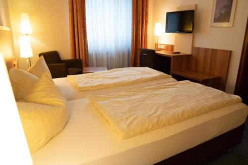 Hotel Jägerhofにあるベッド