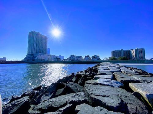 a view of a body of water with buildings at 3 bedroom Atlantic City House Steps from Boardwalk, beach, shopping , nightlife. in Atlantic City