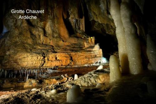 a view of a cave with some ice formations at LA BASTIDE DU SOLEIL avec piscine, calme, randonnée à proximité in Allegre Les Fumades