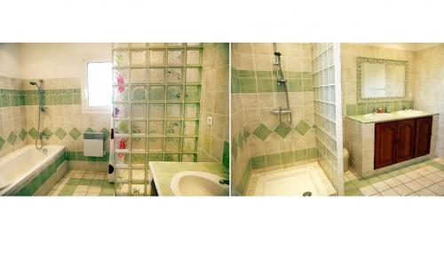 une salle de bain avec une baignoire, un lavabo et une douche dans l'établissement Maison avec piscine la bastide, à Carcès