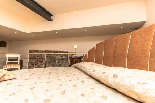 A bed or beds in a room at Beautiful Suite By Villa Il Mosaico