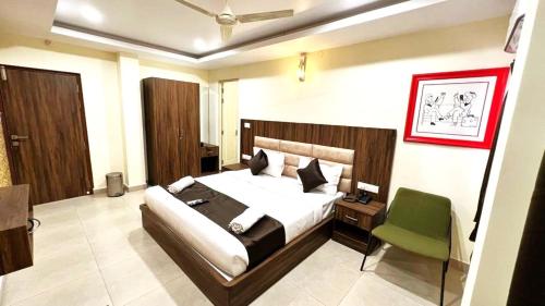 Ένα ή περισσότερα κρεβάτια σε δωμάτιο στο UR Residency New BEL ROAD