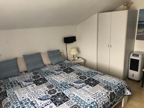 Postel nebo postele na pokoji v ubytování Apartment Sabine