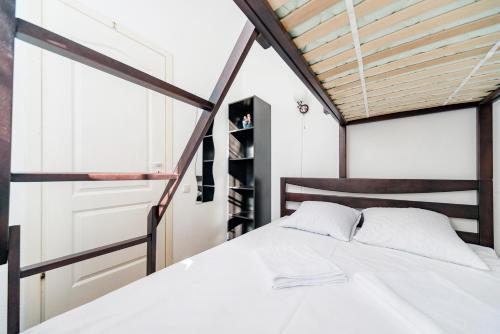 Postel nebo postele na pokoji v ubytování Muzey Hostel