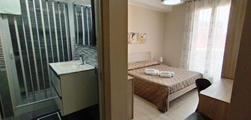 Koupelna v ubytování Giliberto Rooms