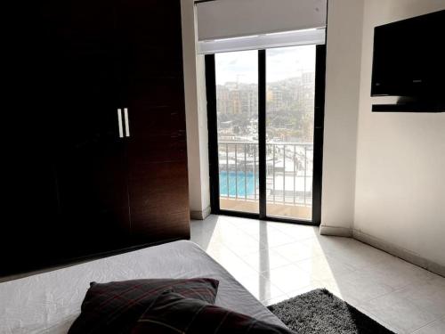 Gulta vai gultas numurā naktsmītnē Seafront Meridionale 2Bedroom Apartment