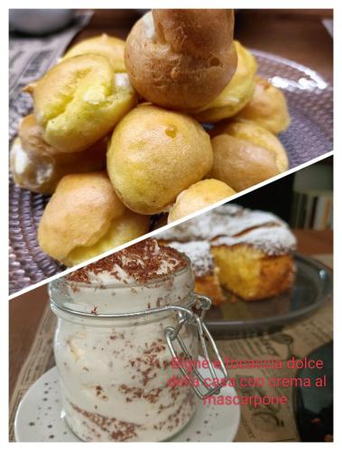 a pile of donuts on a plate next to a jar at BB LETTERARIO in Ravenna