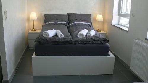 Letto o letti in una camera di Pension Bad Soden / Apartment and Rooms