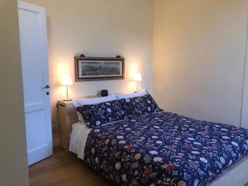 A bed or beds in a room at Amor Fati