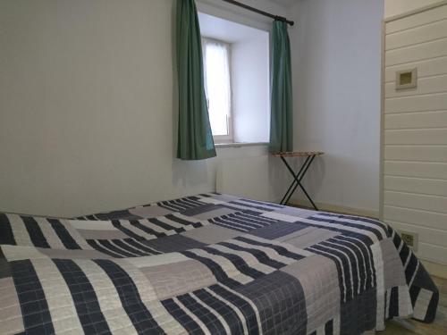Katil atau katil-katil dalam bilik di Les Appartements de Johann