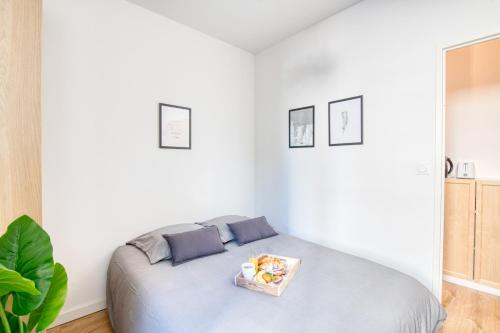 Postel nebo postele na pokoji v ubytování Simply'Compans Appart Centre ville