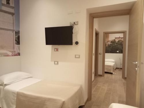 Hotel Porta Riveraにあるベッド