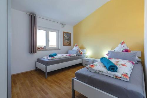 Ένα ή περισσότερα κρεβάτια σε δωμάτιο στο Villa Kapelica Labin