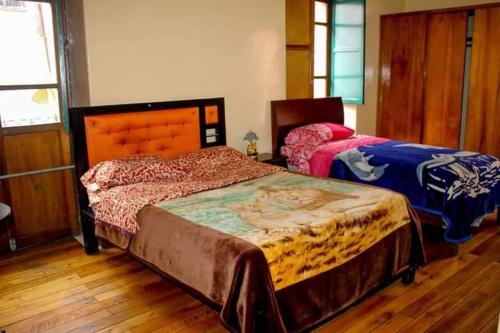 Cama o camas de una habitación en Hostal Mediodía MATRIZ