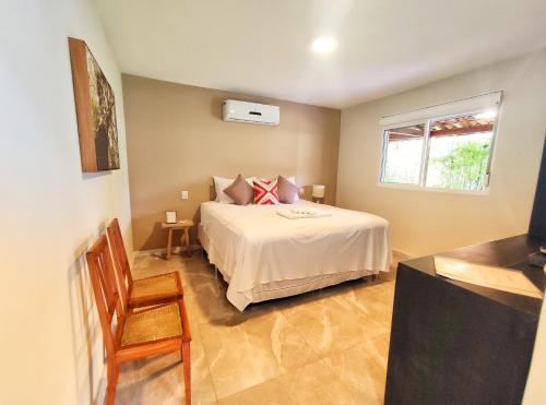 Katil atau katil-katil dalam bilik di Pousada Villa Magna - Suite