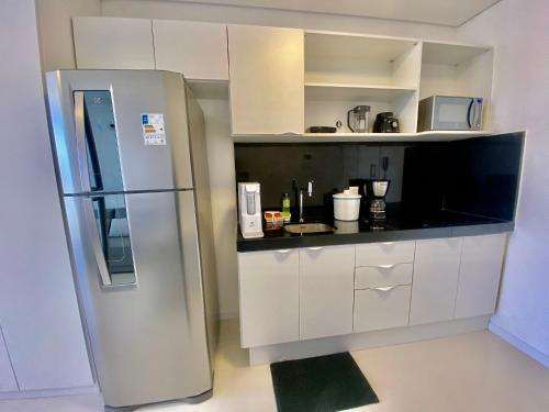 A cozinha ou kitchenette de Edifício SKY Apto 1210 - ER Hospedagens