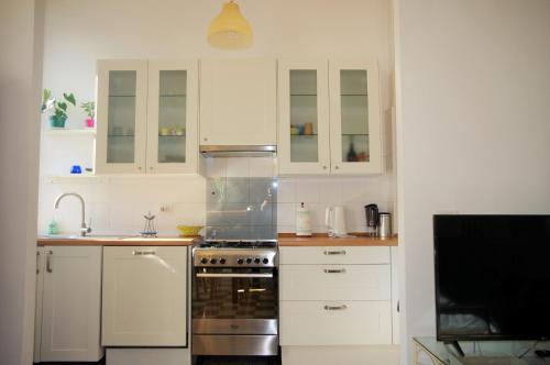 Dapur atau dapur kecil di Incantevole Appartamento De Angeli