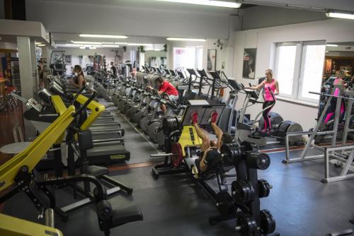 a group of people exercising in a gym at Apartment Dachstein nahe Zentrum in Bad Ischl