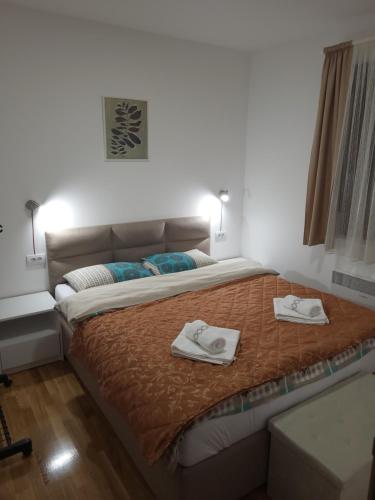 Ένα ή περισσότερα κρεβάτια σε δωμάτιο στο FoRest apartment & spa