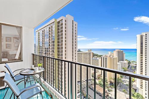 a balcony with a view of the ocean at 30FL Great Ocean Views with Lanai, King bed, Parking in Honolulu
