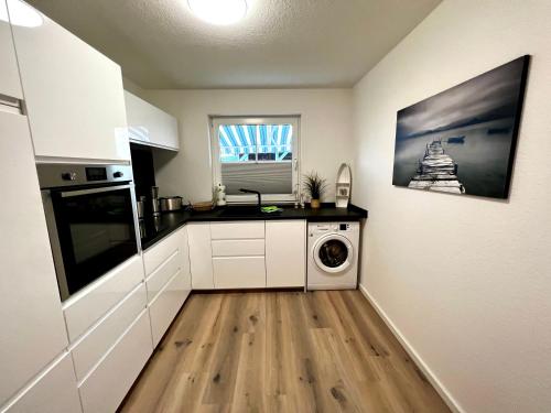 Dapur atau dapur kecil di Apartment Klabautermann