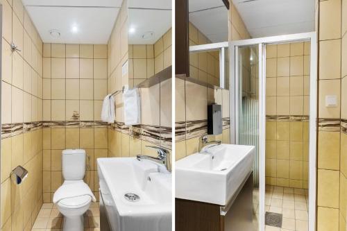 two pictures of a bathroom with a toilet and a sink at Best Western Plaza Hotel in Eskilstuna