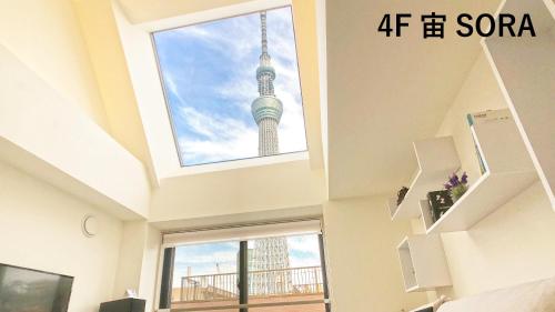 a room with a view of the osaka tower at La Krasse Sumida in Tokyo