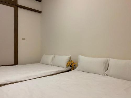 Ein Bett oder Betten in einem Zimmer der Unterkunft Oh! Yosuw BnB