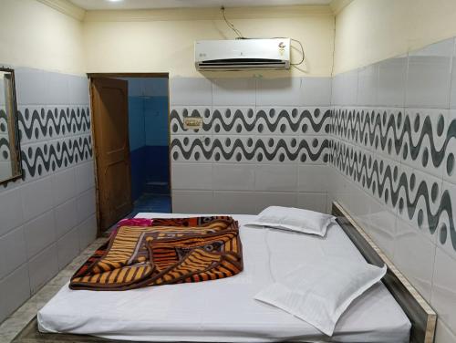 Krevet ili kreveti u jedinici u okviru objekta Hotel Kohinoor Palace