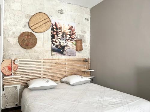 Ένα ή περισσότερα κρεβάτια σε δωμάτιο στο Appartement Saint Rémy de Provence