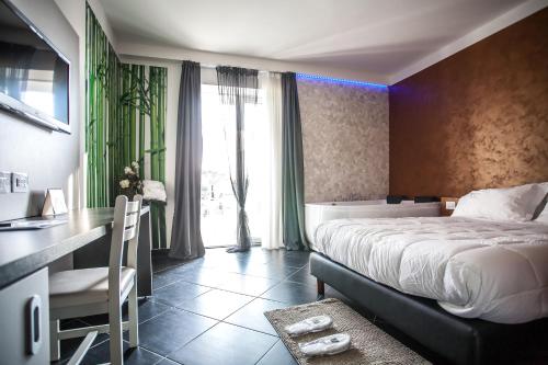 Ein Bett oder Betten in einem Zimmer der Unterkunft Hotel Oceanomare