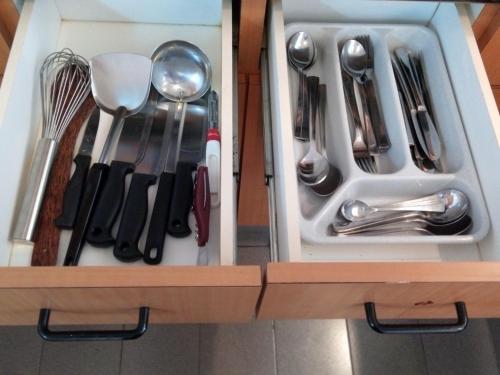 a drawer filled with silver utensils in a kitchen at Cityview Serviced Apartment & Hotel Ho Chi Minh City in Ho Chi Minh City