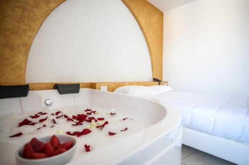 Postel nebo postele na pokoji v ubytování Hotel Oceanomare
