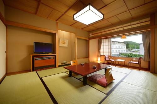 Afbeelding uit fotogalerij van Senkeien Tsukioka Hotel in Kaminoyama