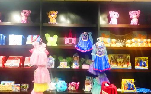 a shelf filled with different types of stuffed animals at Anaheim Majestic Garden Hotel in Anaheim