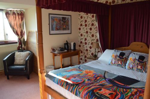 Katil atau katil-katil dalam bilik di Hunters Lodge Hotel
