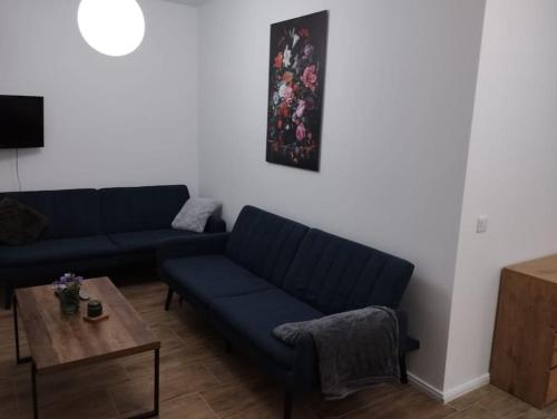 Posezení v ubytování Appartement 4 Personen - Zimmer in Wohnung, zentral, ruhig, modern
