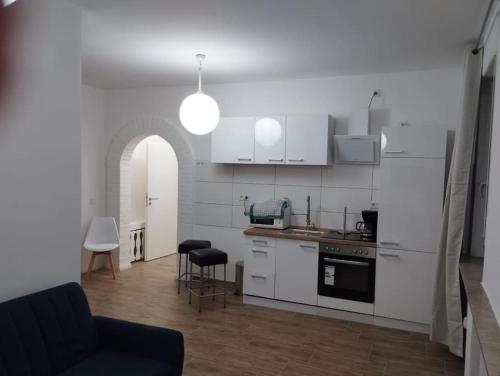 Kuchyň nebo kuchyňský kout v ubytování Appartement 4 Personen - Zimmer in Wohnung, zentral, ruhig, modern
