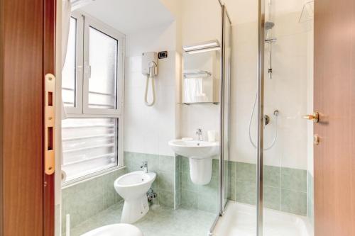 Koupelna v ubytování Hotel Flavio