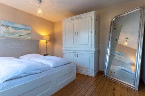 Postel nebo postele na pokoji v ubytování Kleinod Appartement Helena