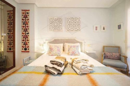 Кровать или кровати в номере Colours Apartamento