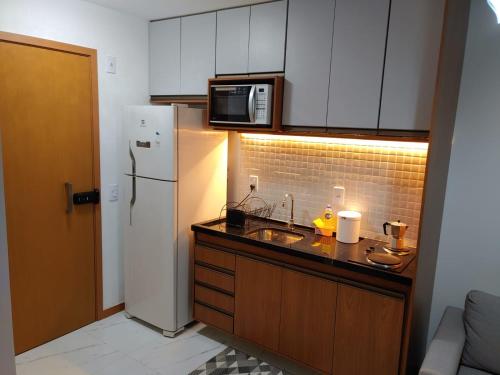 A cozinha ou cozinha compacta de Apartamento próximo ao Farol da Barra