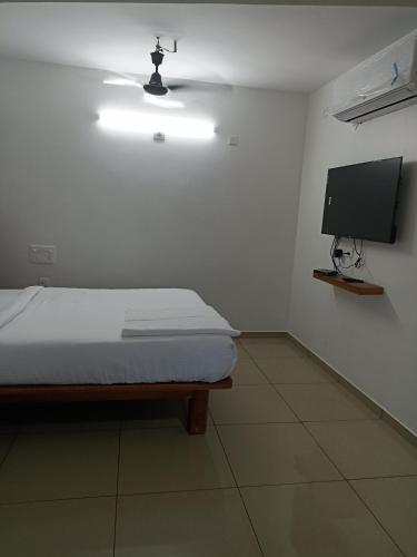 Ein Bett oder Betten in einem Zimmer der Unterkunft Padilgate Luxuryinn