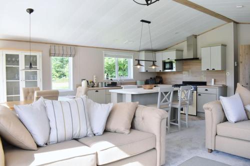 Kuchyň nebo kuchyňský kout v ubytování Snittlegarth Farm Lodges