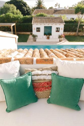 a group of pillows sitting on top of a roof at The Adelante House in Jávea