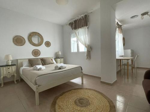 A bed or beds in a room at VTZ El Balcón de Rey Alfonso V