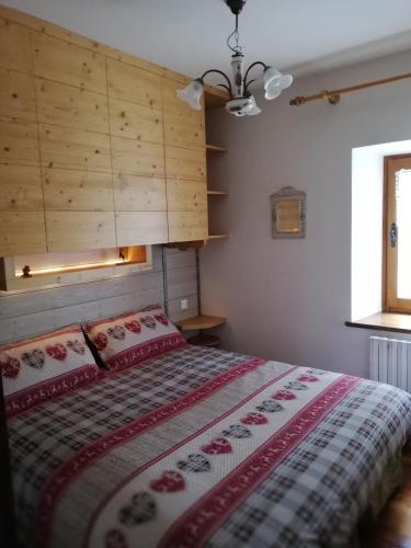 Ένα ή περισσότερα κρεβάτια σε δωμάτιο στο Natura e comfort
